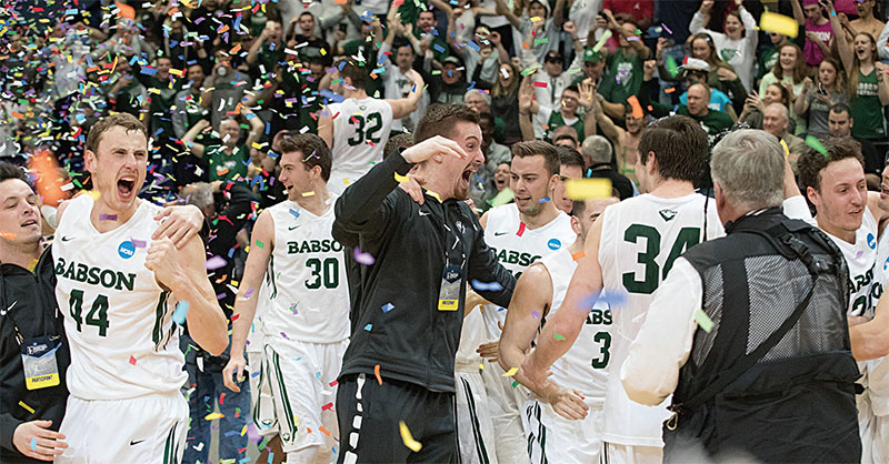 Babson players and managers celebrate after defeating Augustana