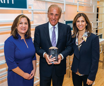 Debi Kleiman, C. Dean Metropoulos ’67, MBA’68, and Marla Capozzi, MBA’96
