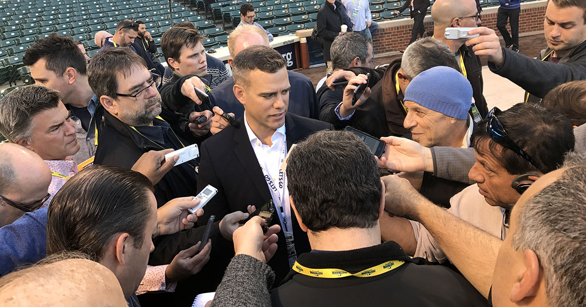 Chicago Cubs President of Baseball Operations Theo Epstein talks to reporters before Game 6 of the 2016 National League Championship Series.