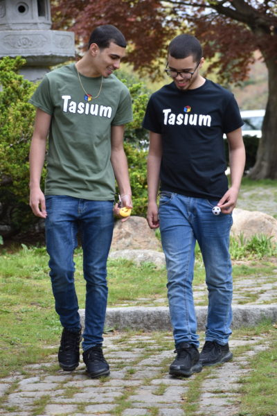 José Rodriguez Jr. and his brother, Joel, display the Tasium T-shirts with fidget toys