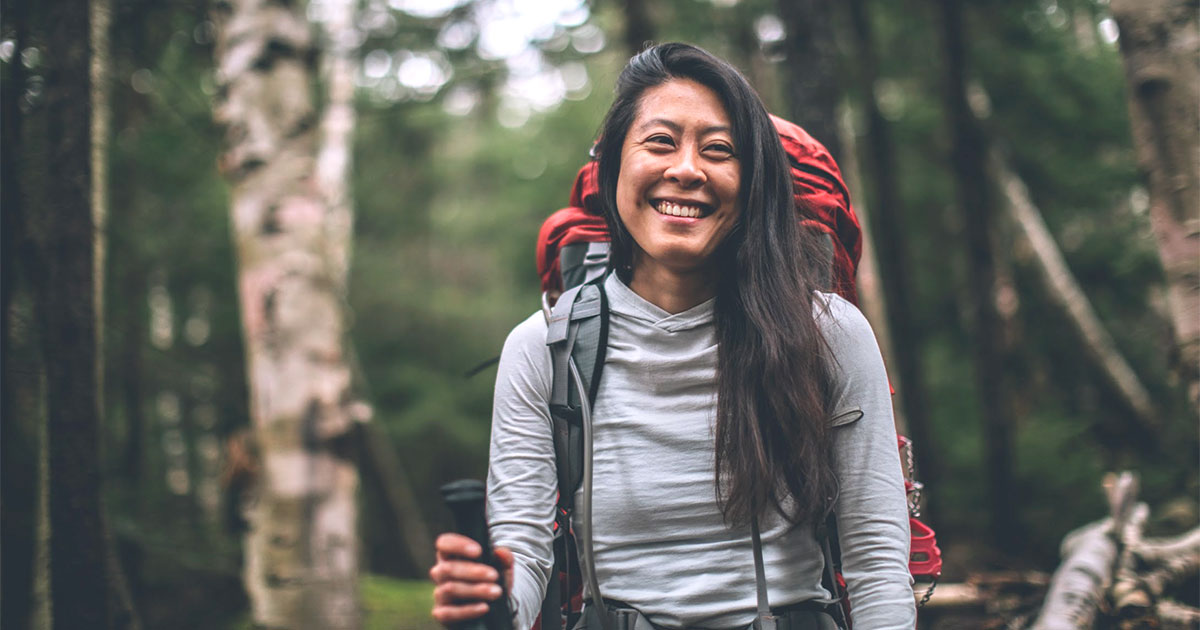 Evadne Cokeh MBA’17 hikes in the woods