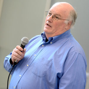 Bill Coyle speaks during the teach-in