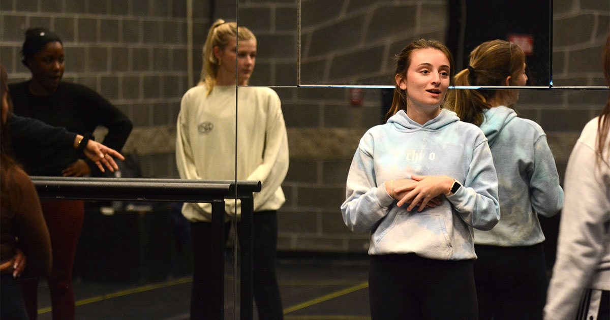 Meredith DeMarco ’22 talks to other members of the Babon Dance Ensemble