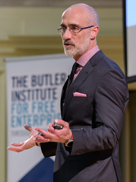 Arthur Brooks gestures while speaking during the event