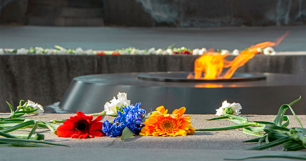 Flowers lie and an eternal flame burns at the Armenian Genocide Memorial