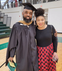 Curtis Augustin MS’22, P’24 (left) and his daughter, Caylene Augustin ’24, at Babson's Staake Gymnasium