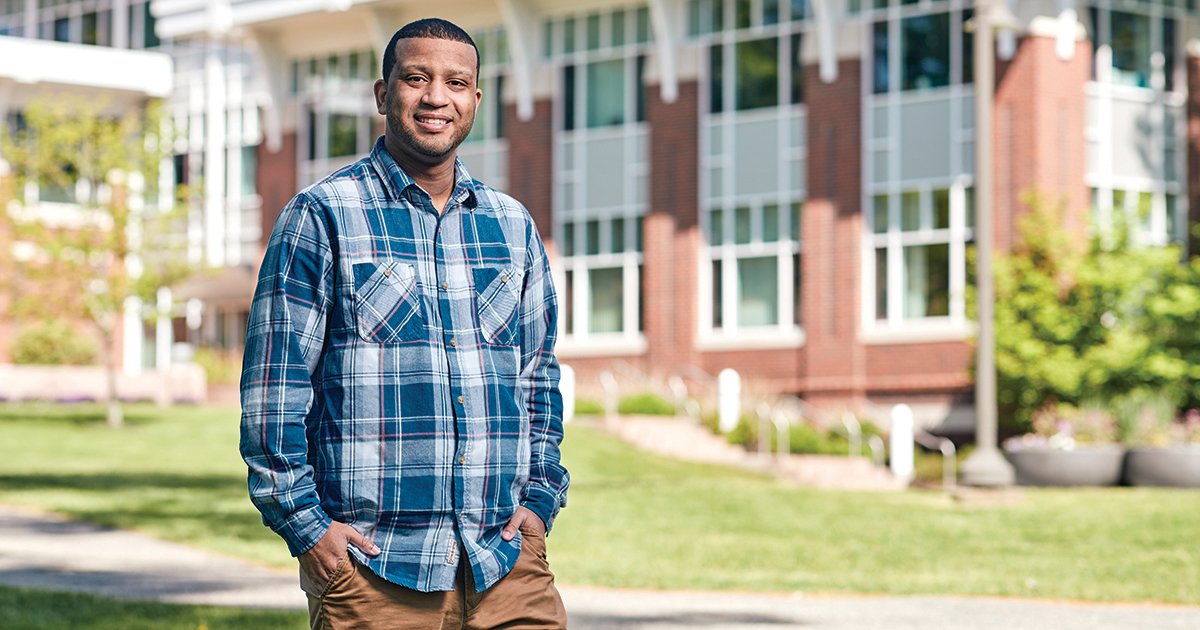 Alexander Oubré MBA’22 poses for a portrait on campus