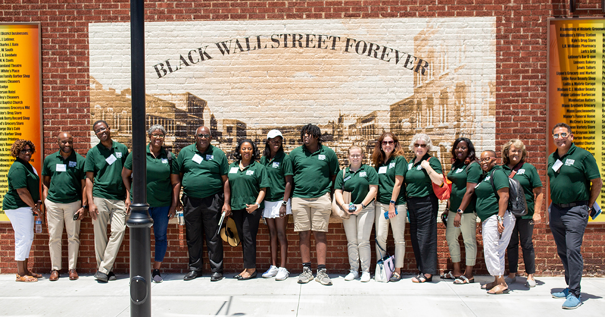 Babson faculty, staff, and other community members stand in Tulsa at heart of former Black Wall Street.
