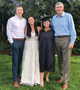 Graduation photo of Catherine Crosby with her family