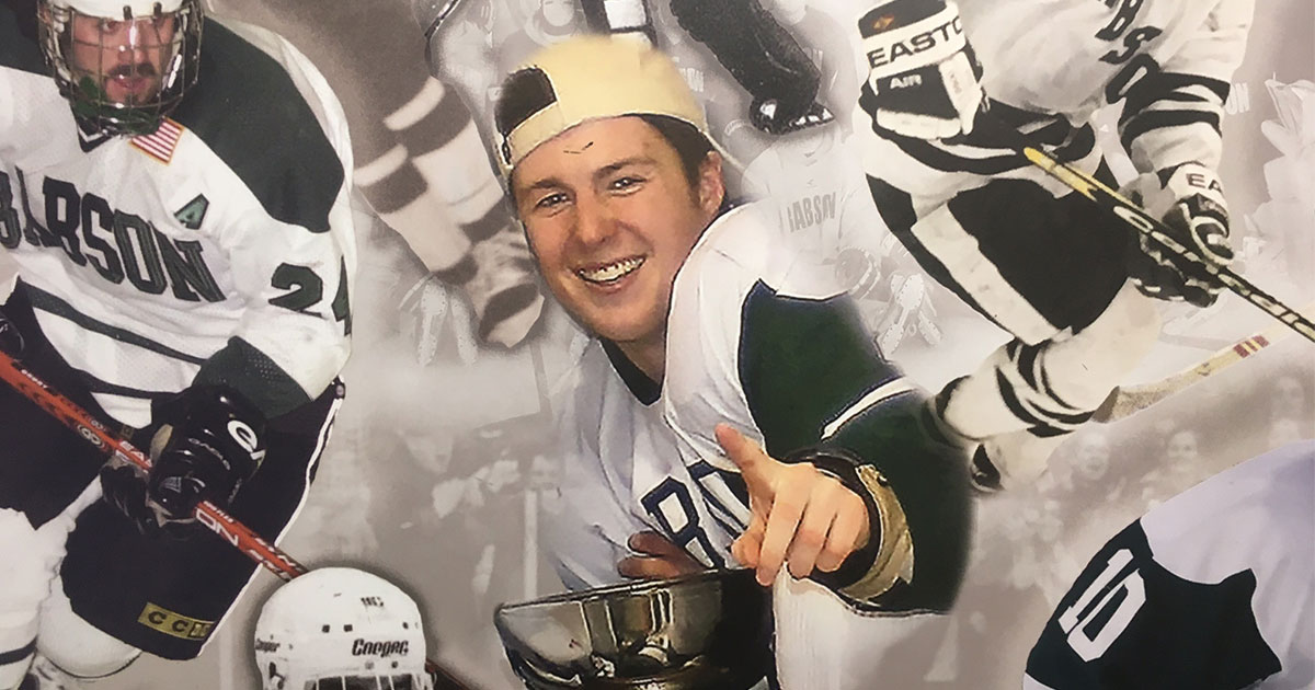 A mural of hockey scenes features the picture of Corey Griffin ’10