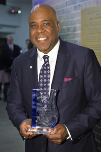 Lawrence P. Ward holds the 2023 Distinguished Alumni Award