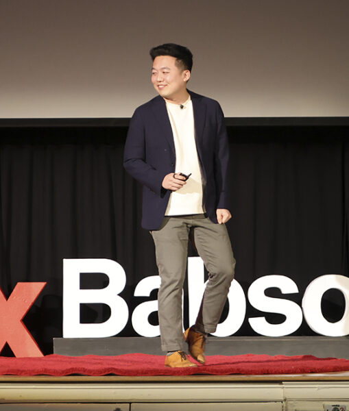 Man on stage at TEDxBabsonCollege