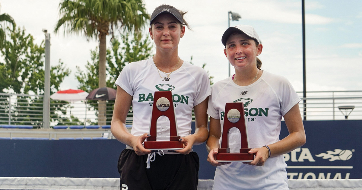 Olivia Soffer and Matia Cristiani pose with their trophies