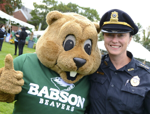 Babson Chief of Police Erin Carcia, seen here with Babson mascot Biz E. Beaver Mascot, started working at Babson in 2011.