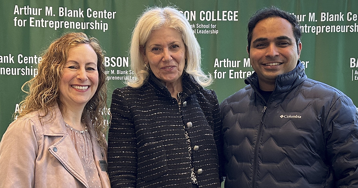 Akhil Nair MBA'18, a former Global Entrepreneur in Residence at Babson College, with the program's director Cindy Klein Marmer and another volunteer.