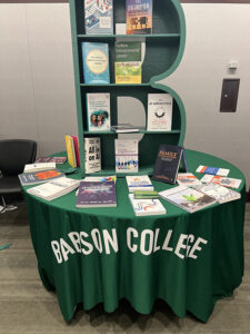 Babson College display feature a B-shaped bookshelf