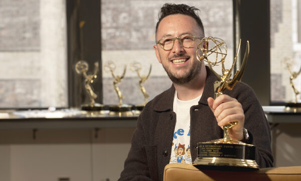 Sammy Dane poses for a portrait with his Emmy Award