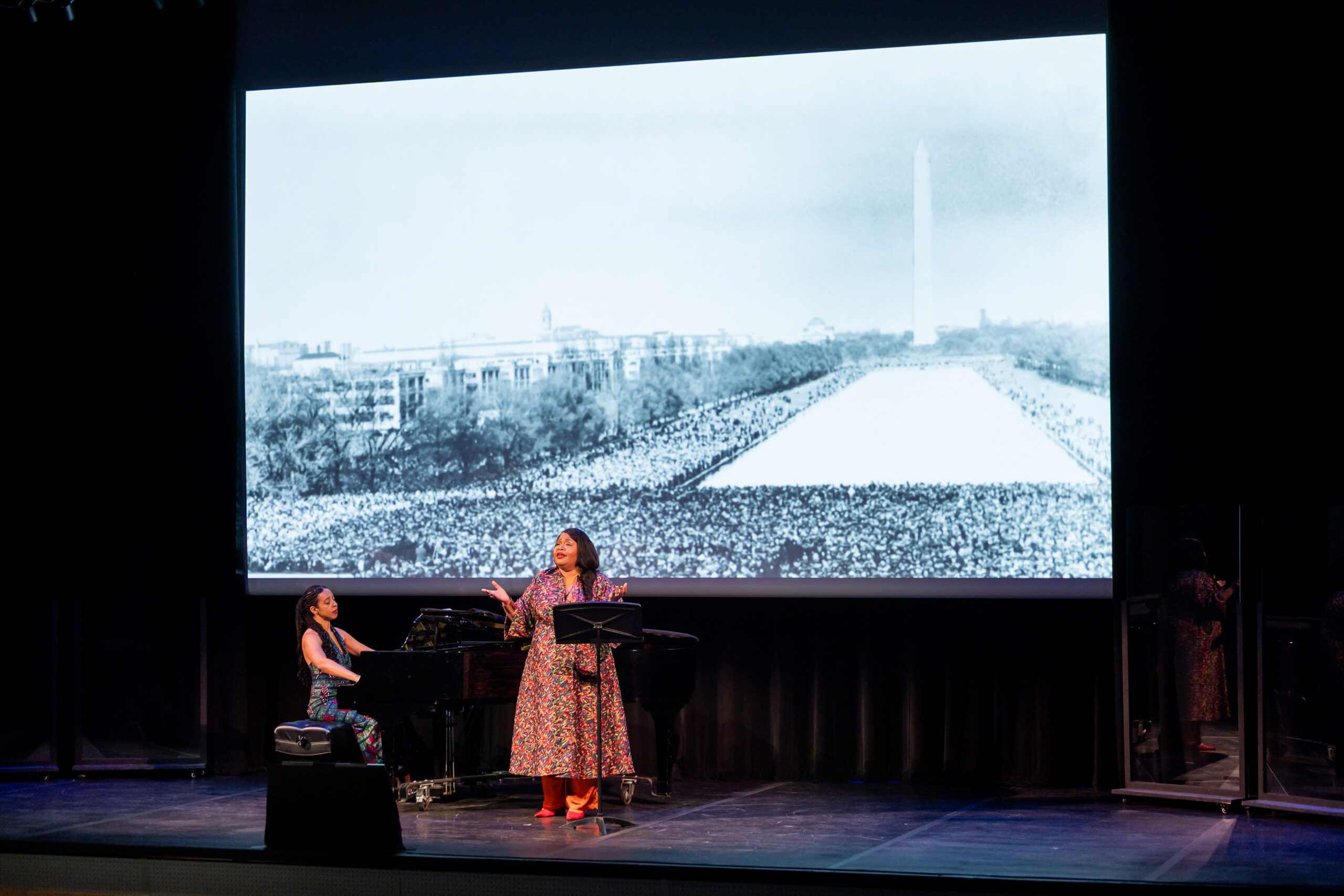 Karen Slack and pianist Kamilla Arku perform on stage at Babson.