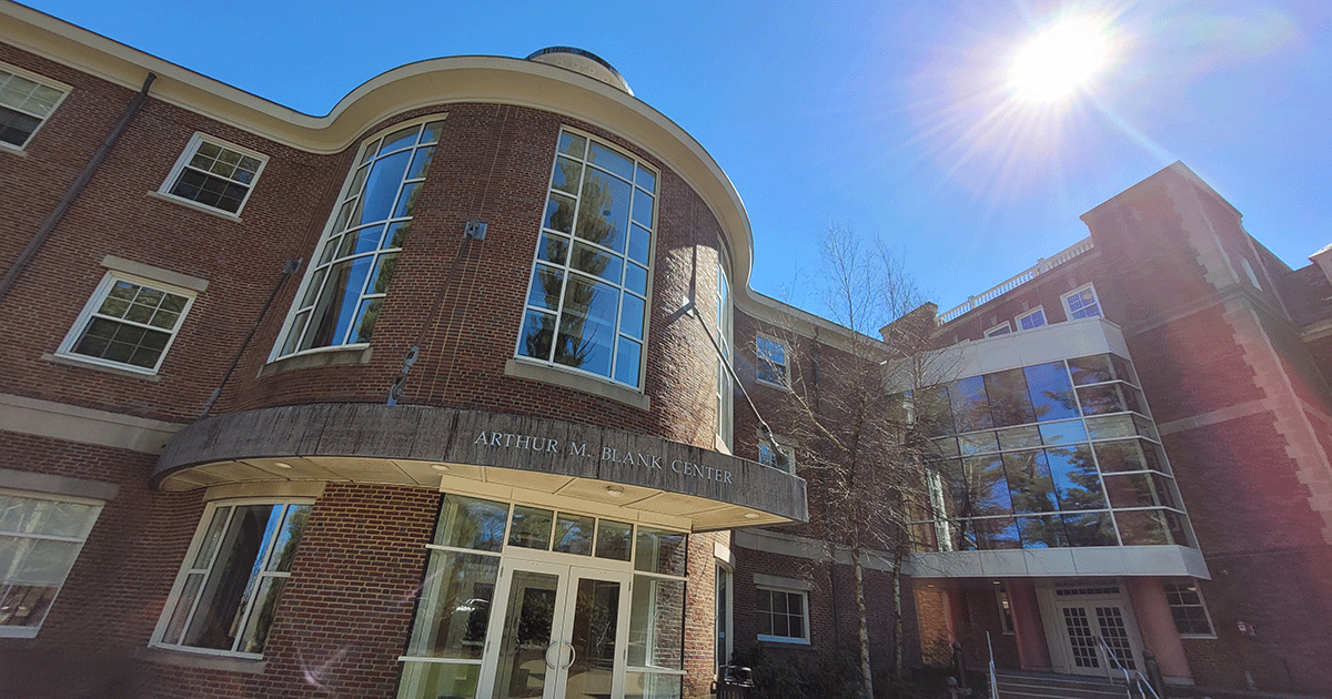 sun shines over the Blank Center at Babson