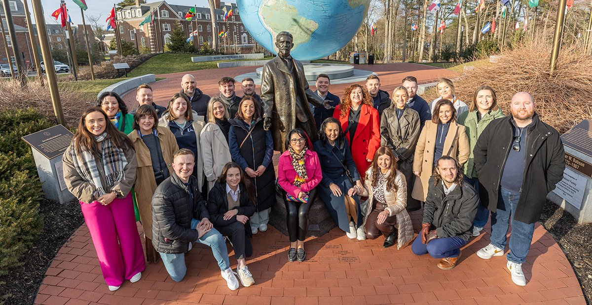 The 25 members of the Ulster University 25@25 cohort in front of the Babson Globe