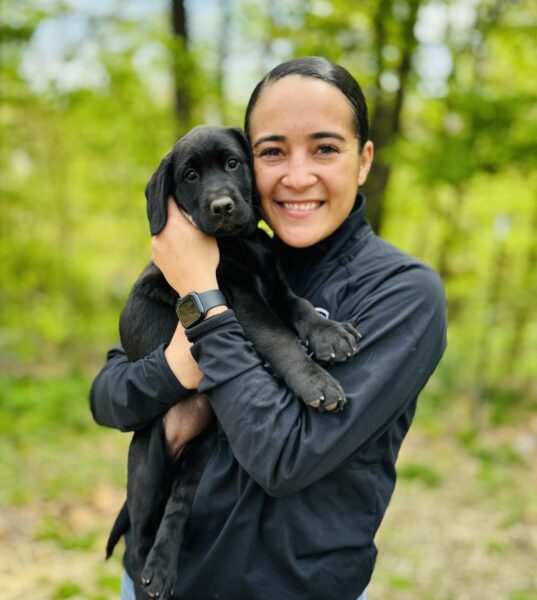 Public Safety Officer Nashley Gonzalez holding Gracie on the first day she brought the puppy home. (Photo curtesy of Nashley Gonzalez)