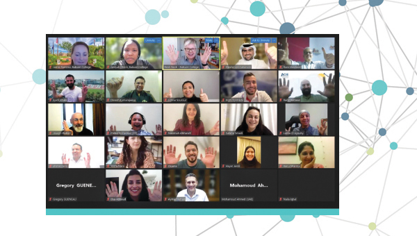 A screen displaying faces in a virtual meeting