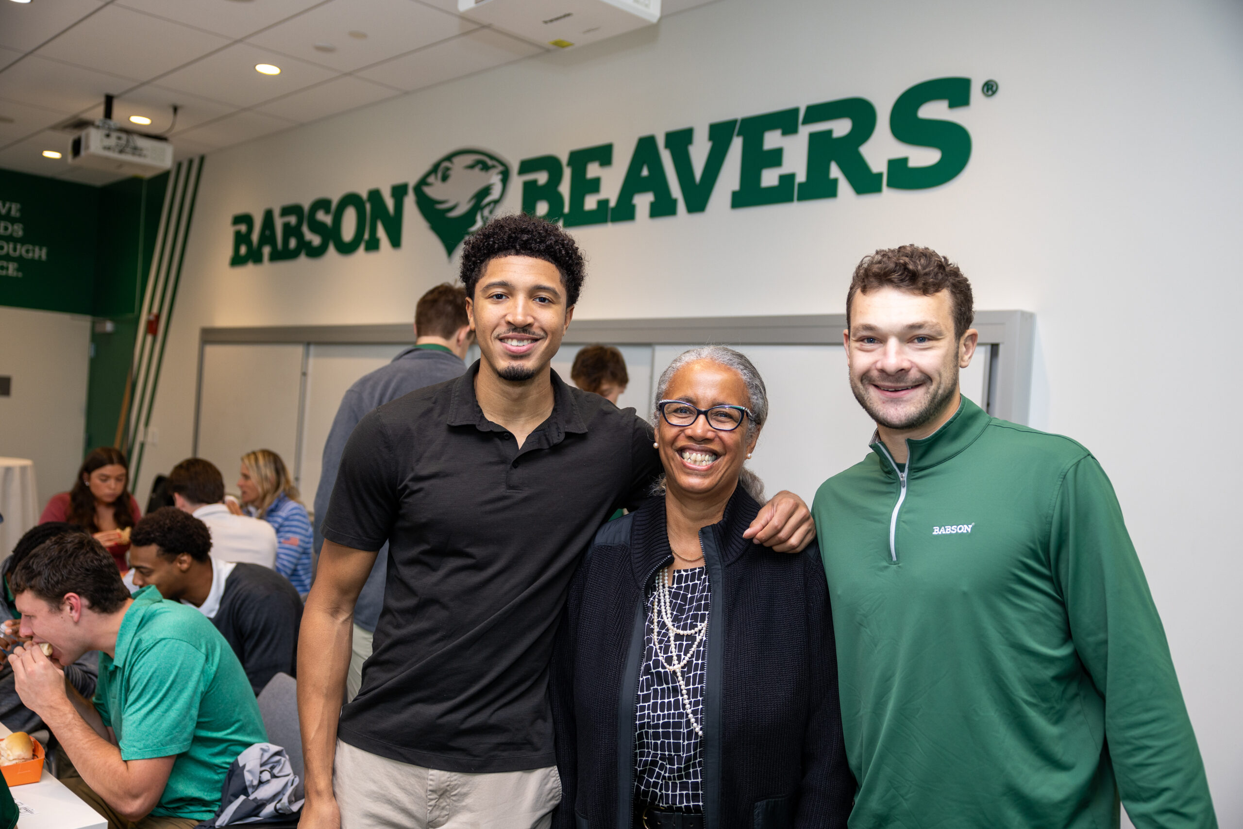 Posing for a photo at Back to Babson