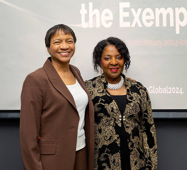 Samantha N.N. Cross and Sadie Burton-Goss pose for a photo