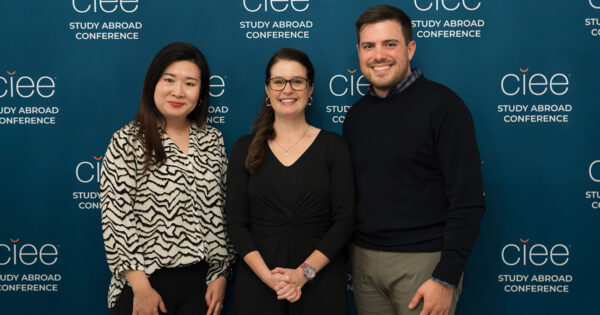 Three Babson representatives pose for a photo at the conference