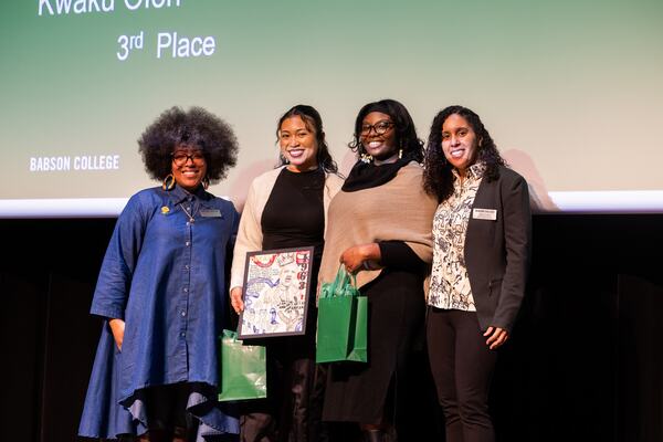 Babson Associate Director for Cultural Life EriKa Monfort presented the Creativity Contest Awards. From left: Monfort, first place winner Semaj Cormier ’27, second place winner Sarai Dorismond ’28, and fellow presenter Karina Ovalles, a student success advisor. (Photo: Nic Czarnecki) 