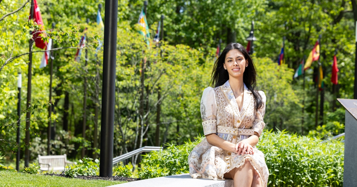 Sheikha Al-Otaibi sitting outside