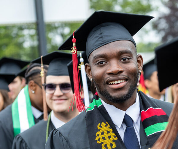 Graduate during college Commencement procession.