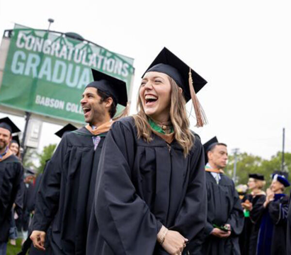 Laughing college graduates.