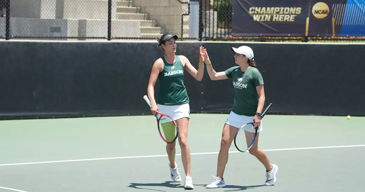 Olivia Soffer and Matia Cristiani high-five on a tennis court