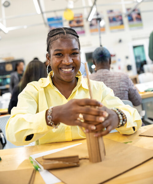 A students works on a project during Babson Build