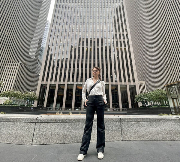 Babson student standing outside the New York City building where the Cleantech Open accelerator met.