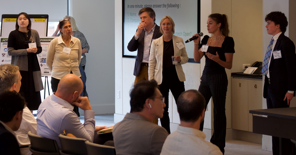 Babson student introduces herself at Cleantech Open.