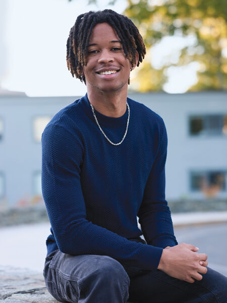 Kaif Bailey poses for a portrait outdoors