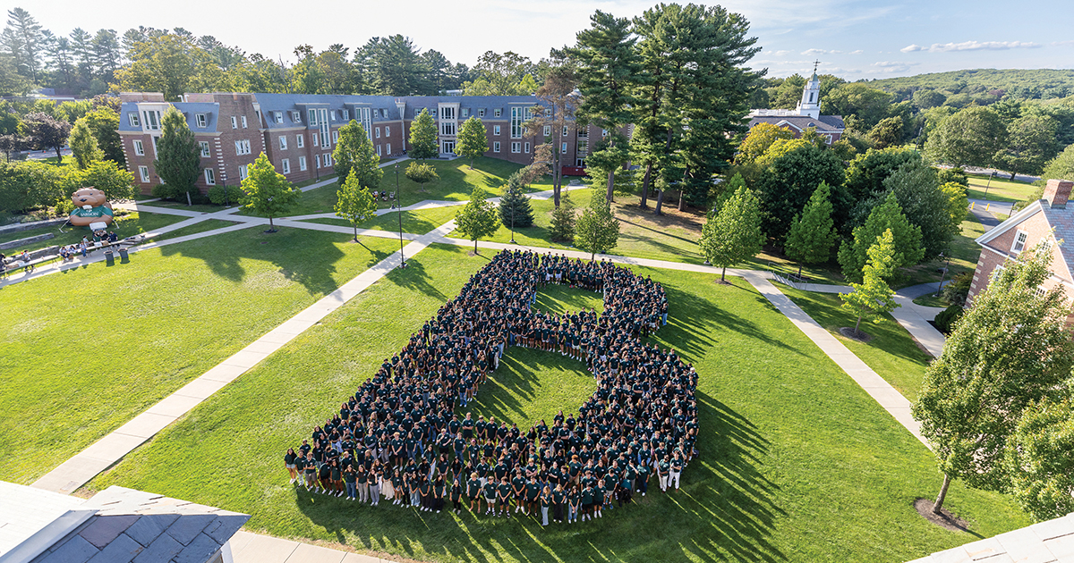 Aerial shot of the quad with students grouped together for form a giant B