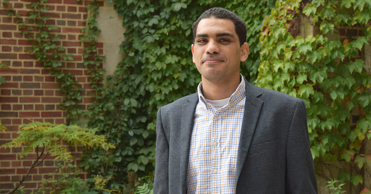 Ahmed Ahmed poses for a portrait photo