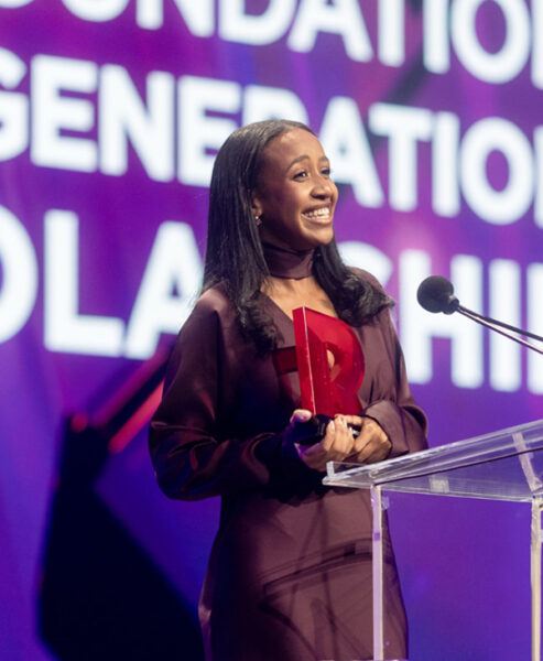 Babson college student accepts National Retail Federation scholarship.