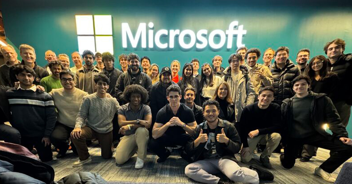 A group of Babson students and small business owners gathers at the offices of Microsoft