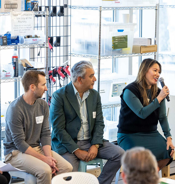 Three Babson alumni sit on stools for a discussion about food ventures.
