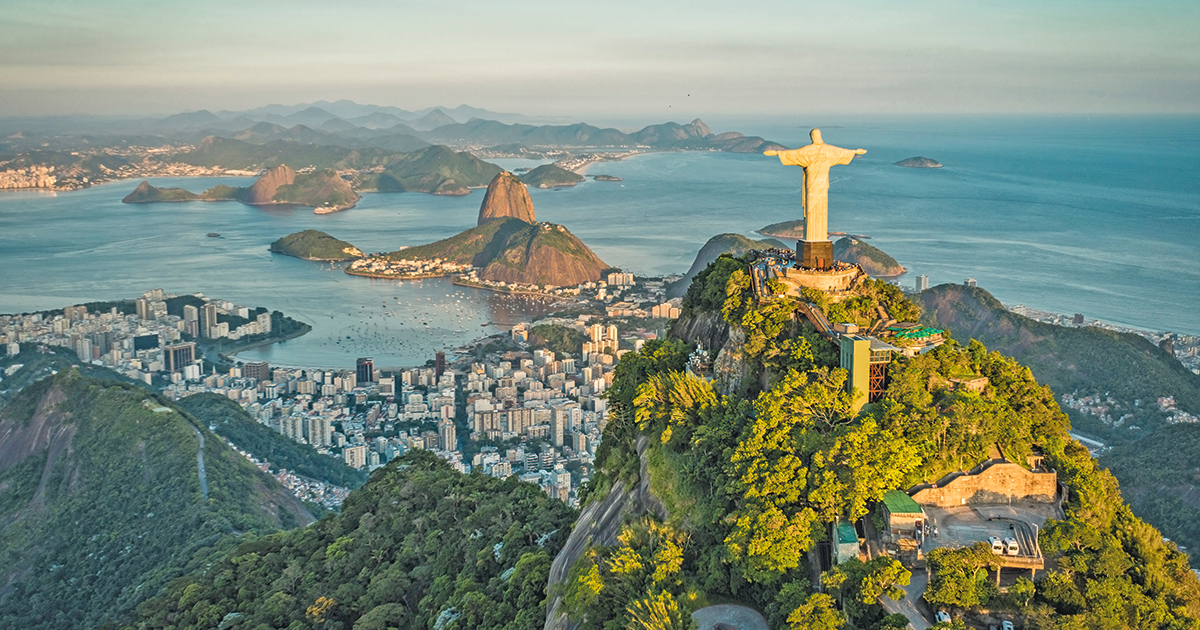 Aerial view of Christ the Redeemer and Botafogo Bay in Rio de Janeiro from high angle.