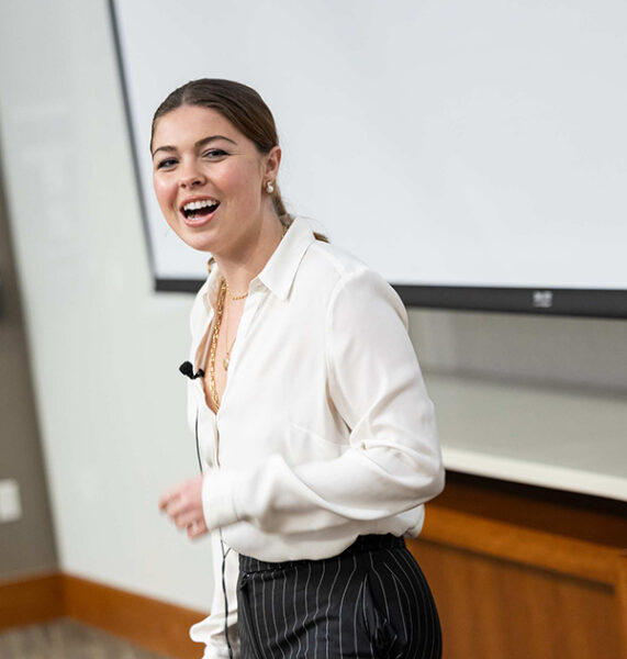Woman pitching her venture during a contest.