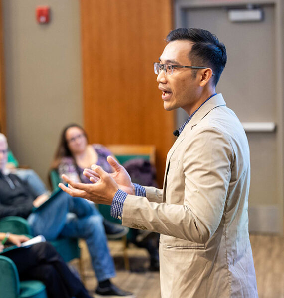 A man pitches his entrepreneurial enterprise in a constest.