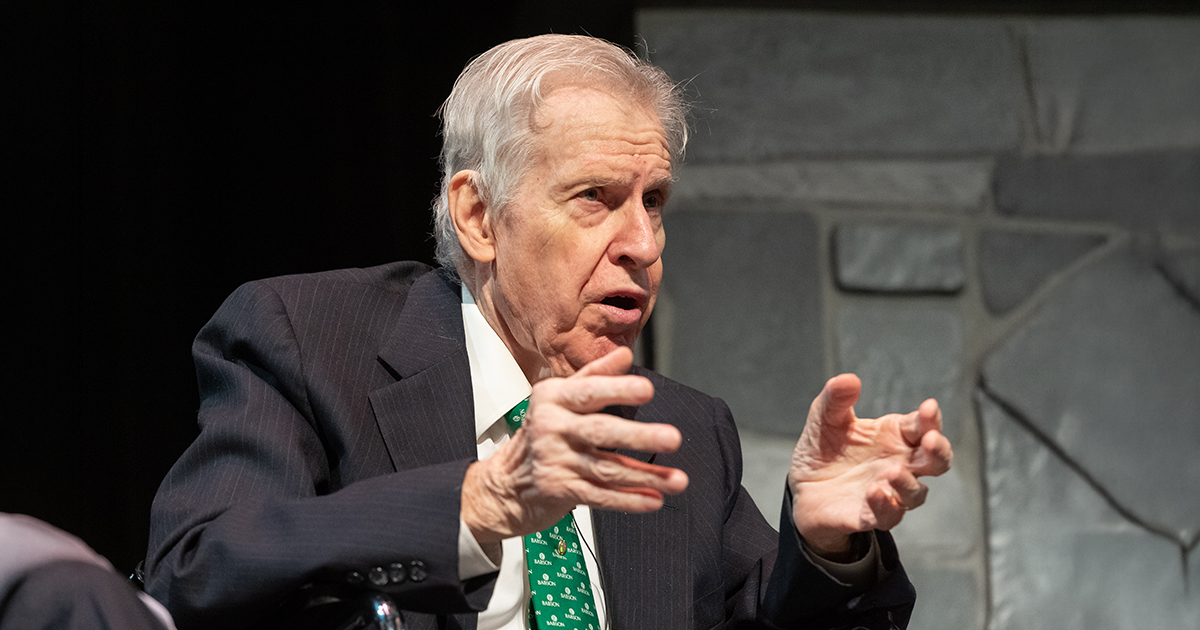 William Dill gestures while speaking during a Babson event in 2019