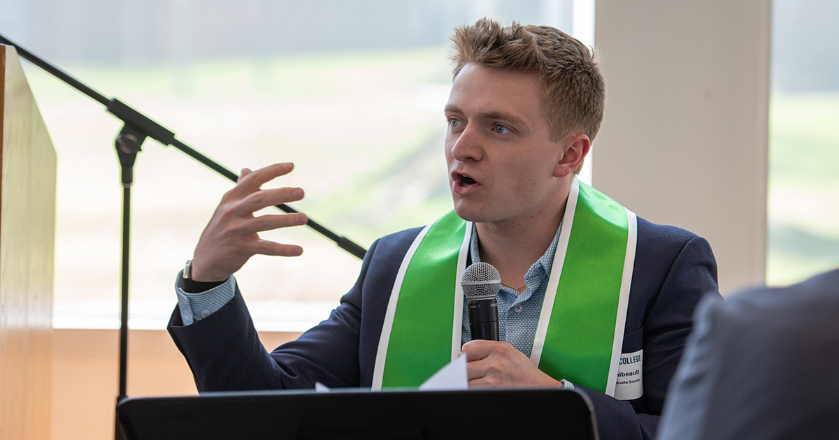 Jake Thibeault gestures while speaking at the awards ceremony