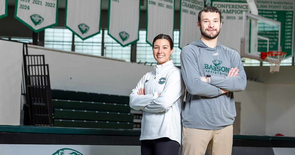Tori Roche and Joey Flannery pose for a portrait at Staake Gymnasium