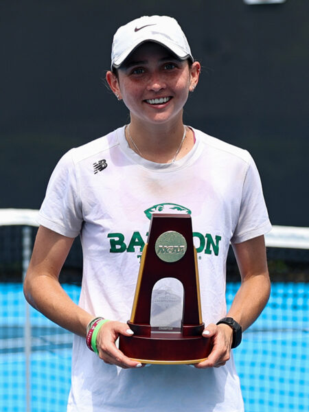 Matia Cristiani poses with the national championship trophy